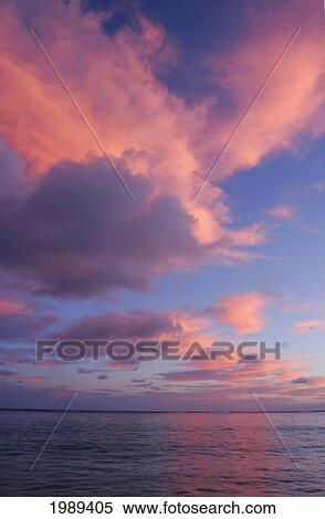 Hawaii, Oahu, Lanikai, Pink Clouds In The Sky At Dawn. View Large Photo Image Stock Photography - Hawaii, Oahu, Lanikai, Pink Clouds In The Sky At Dawn.. Fotosearch
