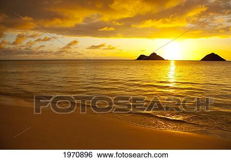 Stock Photograph - Hawaii, Oahu, Lanikai, Sunrise Over The Mokulua Islands.. Fotosearch