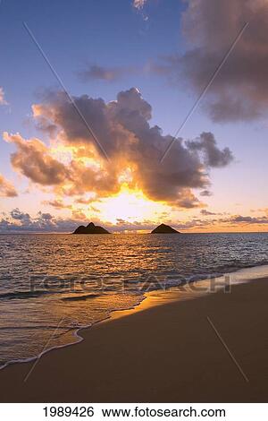 Hawaii, Oahu, Lanikai, Sunrise With The Mokulua Islands In The Distance. View Large Photo Image Stock Photograph - Hawaii, Oahu, Lanikai, Sunrise With The Mokulua Islands In The Distance.. Fotosearch
