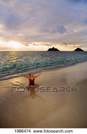Hawaii, Oahu, Lanikai, Woman Doing Yoga On The Beach At Sunrise. View Large Photo Image Picture - Hawaii, Oahu, Lanikai, Woman Doing Yoga On The Beach At Sunrise.. Fotosearch