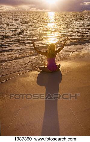 Hawaii, Oahu, Lanikai, Woman Doing Yoga On The Beach At Sunrise. View Large Photo Image Stock Image - Hawaii, Oahu, Lanikai, Woman Doing Yoga On The Beach At Sunrise.. Fotosearch