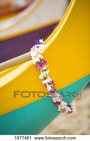 Hawaii, Oahu, Lei Draped Over Outrigger Canoe. View Large Photo Image Stock Image - Hawaii, Oahu, Lei Draped Over Outrigger Canoe.. Fotosearch