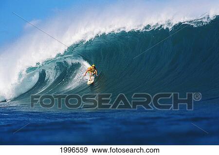 Stock Photo - Hawaii, Oahu, Liam (Surfer) Surfing Pipeline Wave.. Fotosearch