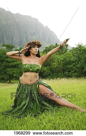 Hawaii, Oahu, Local Hawaiian Female Doing A Kahiko Hula Dance. View Large Photo Image Stock Photo - Hawaii, Oahu, Local Hawaiian Female Doing A Kahiko Hula Dance.. Fotosearch