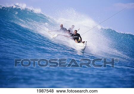 Hawaii, Oahu, Makaha, Men Surfing Wave In White Outrigger Canoe, View From Front. No Model Release View Large Photo Image Stock Photo - Hawaii, Oahu, Makaha, Men Surfing Wave In White Outrigger Canoe, View From Front. No Model Release. Fotosearch