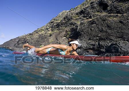 Stock Photo - Hawaii, Oahu, Makapuu, Woman On Paddleboard.. Fotosearch