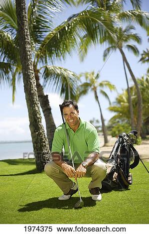 Hawaii, Oahu, Male Golfer On Golf Course. View Large Photo Image Stock Photography - Hawaii, Oahu, Male Golfer On Golf Course.. Fotosearch