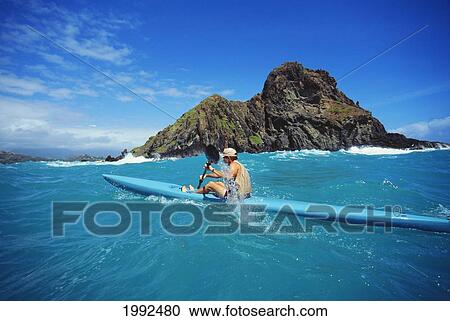 Hawaii, Oahu, Man Kayaking Along Offshore Islands. View Large Photo Image Stock Image - Hawaii, Oahu, Man Kayaking Along Offshore Islands.. Fotosearch