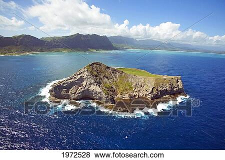 Stock Photo - Hawaii, Oahu, Manana Island Aka Rabbit Island Mountains In Distance.. Fotosearch