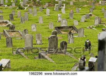 Stock Photograph - Hawaii, Oahu, Manoa Valley, Chinese Cemetery at Woodlawn, well-known for being haunted.. Fotosearch