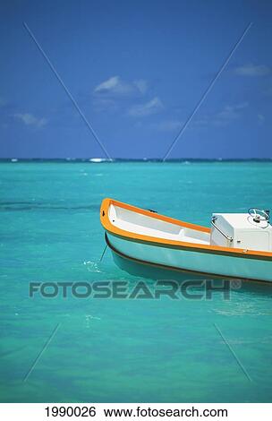 Hawaii, Oahu, Mokulua Islands, Boat Floating In Turquoise Water Blue Skies View Large Photo Image Stock Photograph - Hawaii, Oahu, Mokulua Islands, Boat Floating In Turquoise Water Blue Skies. Fotosearch