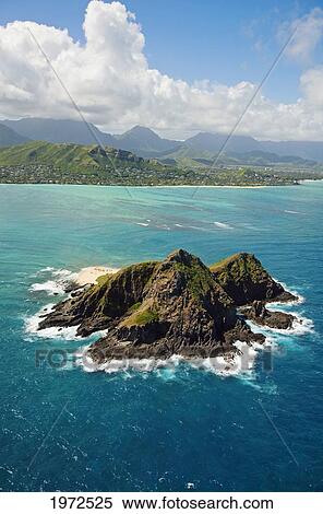 Stock Photography - Hawaii, Oahu, Mokulua Islets, Group Of Kayakers On The Beach Of Moku Nui Islet.. Fotosearch
