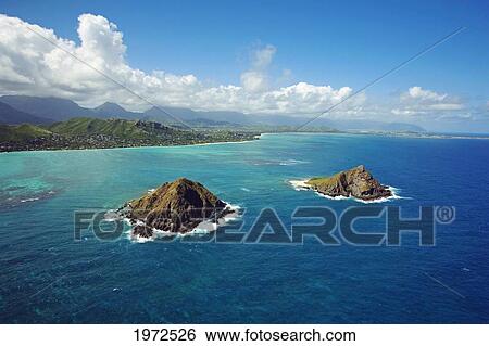 Stock Photograph - Hawaii, Oahu, Mokulua Islets, Part Of The Hawaii State Bird Sanctuary.. Fotosearch