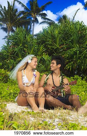 Hawaii, Oahu, Newlywed Couple With Ukulele View Large Photo Image Stock Photograph - Hawaii, Oahu, Newlywed Couple With Ukulele. Fotosearch