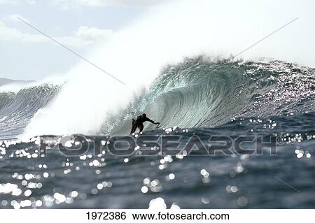 Stock Photograph - Hawaii, Oahu, North Shore, Afternoon Surfing On Large Waves. Editorial Use Only.. Fotosearch