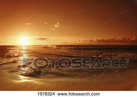 Picture - Hawaii, Oahu, North Shore, Beautiful Sunset Over The Ocean.. Fotosearch