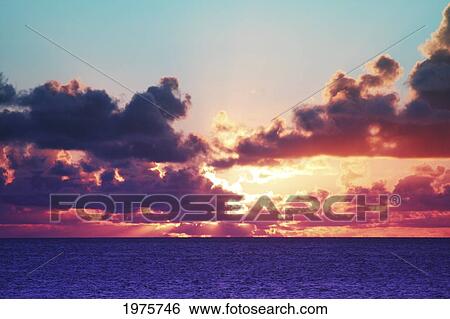 Hawaii, Oahu, North Shore, Beautiful Sunset Over The Ocean. View Large Photo Image Stock Photograph - Hawaii, Oahu, North Shore, Beautiful Sunset Over The Ocean.. Fotosearch