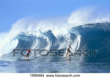 Hawaii, Oahu, North Shore, Conan Hayes (Right) Two Men Riding Large Wave View Large Photo Image Picture - Hawaii, Oahu, North Shore, Conan Hayes (Right) Two Men Riding Large Wave. Fotosearch