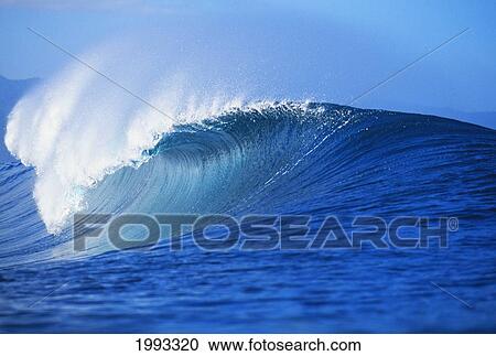 Stock Image - Hawaii, Oahu, North Shore, Front Angled View Of Pipeline Wave Curling.. Fotosearch