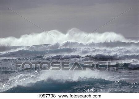 Stock Photo - Hawaii, Oahu, North Shore, Front Distant View Of High Waves, Gray Stormy A30C. Fotosearch