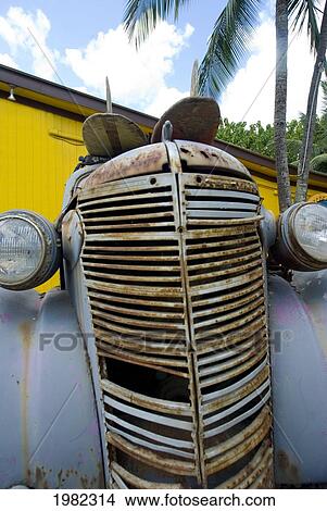 Hawaii, Oahu, North Shore, Haleiwa, rusty old car outside of a surfshop View Large Photo Image Picture - Hawaii, Oahu, North Shore, Haleiwa, rusty old car outside of a surfshop. Fotosearch