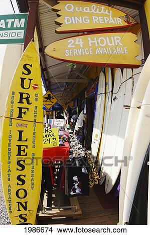Picture - Hawaii, Oahu, North Shore, Haleiwa, Outside Of Local Surf Shop, Signs And Merchandise.. Fotosearch