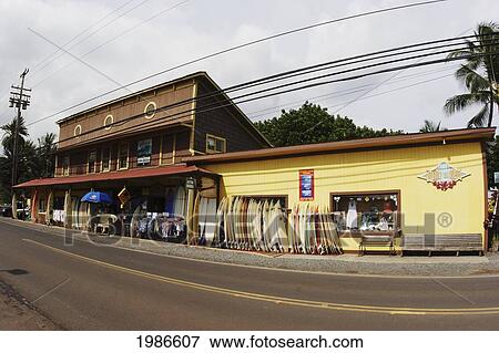 Stock Photo - Hawaii, Oahu, North Shore, Haleiwa, Outside Of Store, Surf & Sea, Surfboards Lined Up Along Building. Fotosearch