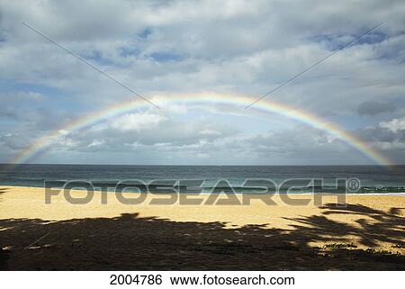 Hawaii, Oahu, North Shore, /Nfull And Vibrant Rainbow Over Ocean. View Large Photo Image Stock Photograph - Hawaii, Oahu, North Shore, /Nfull And Vibrant Rainbow Over Ocean.. Fotosearch