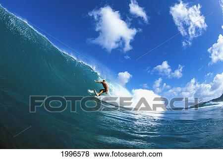 Hawaii, Oahu, North Shore, Pancho Sullivan Rides Wave, Curling Behind, Blue Sky With Clouds View Large Photo Image Stock Photo - Hawaii, Oahu, North Shore, Pancho Sullivan Rides Wave, Curling Behind, Blue Sky With Clouds. Fotosearch