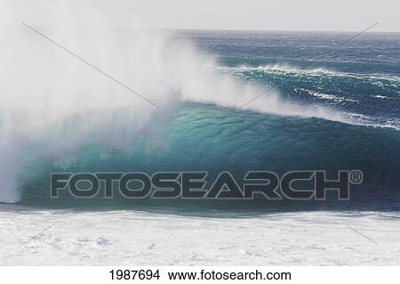 Picture - Hawaii, Oahu, North Shore, Pipeline, Big Curling Wave.. Fotosearch