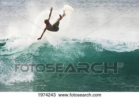 Stock Image - Hawaii, Oahu, North Shore, Pipeline, Surfer, Riding A Wave.. Fotosearch