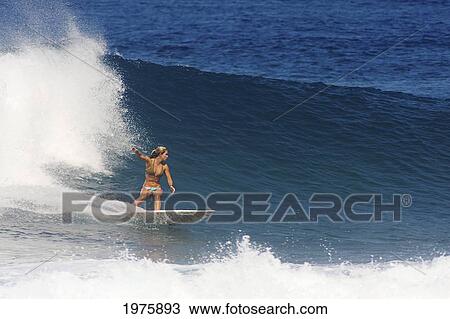 Stock Image - Hawaii, Oahu, North Shore, Pipeline, Surfer, Riding A Wave.. Fotosearch