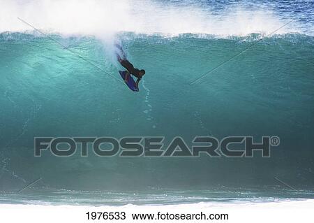 Stock Image - Hawaii, Oahu, North Shore, Pipeline Bodyboarder.. Fotosearch