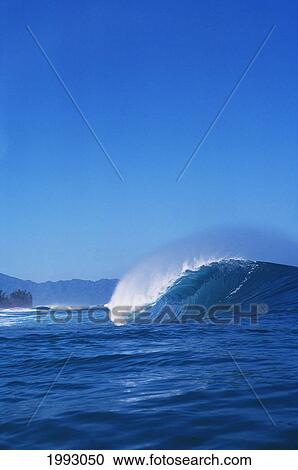 Stock Image - Hawaii, Oahu, North Shore, Pipeline, Curling Wave.. Fotosearch