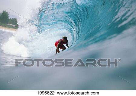 Hawaii, Oahu, North Shore, Pipeline, David Cantrell Crouching In Tube, Drags Hand In Curling Wave View Large Photo Image Stock Image - Hawaii, Oahu, North Shore, Pipeline, David Cantrell Crouching In Tube, Drags Hand In Curling Wave. Fotosearch