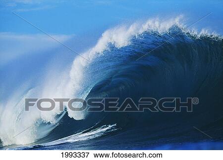 Stock Photo - Hawaii, Oahu, North Shore, Pipeline, Big Blue Wave Curling With Mist Blowing Off Tip. Fotosearch