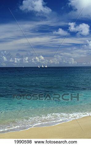 Hawaii, Oahu, North Shore, Sailboat Race In Distance, View From Shoreline, Wispy Clouds View Large Photo Image Stock Photo - Hawaii, Oahu, North Shore, Sailboat Race In Distance, View From Shoreline, Wispy Clouds. Fotosearch