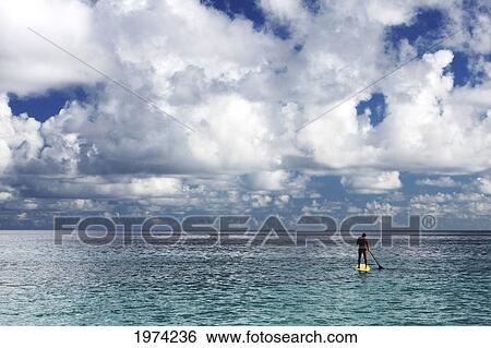 Hawaii, Oahu, North Shore, Stand Up Paddling. View Large Photo Image Stock Photograph - Hawaii, Oahu, North Shore, Stand Up Paddling.. Fotosearch