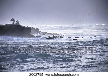 Stock Photography - Hawaii, Oahu, North Shore, Stormy Silver Seas Off Waimea Bay Shoreline. Fotosearch