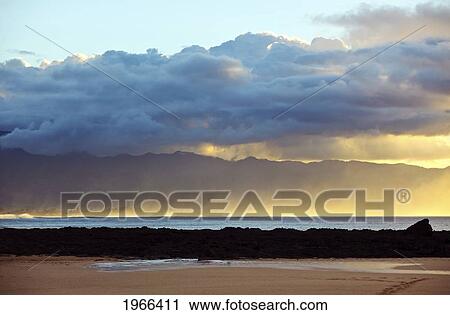 Hawaii, Oahu, North Shore, Sunlight Illuminating Ocean Mist - Late Afternoon. View Large Photo Image Stock Image - Hawaii, Oahu, North Shore, Sunlight Illuminating Ocean Mist - Late Afternoon.. Fotosearch