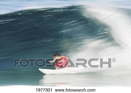 Stock Image - Hawaii, Oahu, North Shore, Surfer, Riding Blur.. Fotosearch
