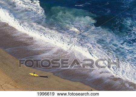 Hawaii, Oahu, North Shore, Waimea Bay, Winter Surf, Surfer Walking, Foamy Waves View Large Photo Image Stock Photo - Hawaii, Oahu, North Shore, Waimea Bay, Winter Surf, Surfer Walking, Foamy Waves. Fotosearch