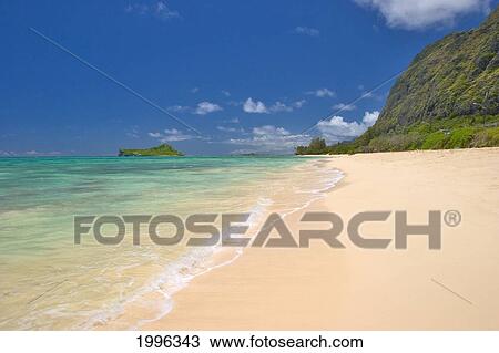Stock Image - Hawaii, Oahu, Ocean, Cliff And View Of Rabbit Island From Makapu'u Beach. Fotosearch