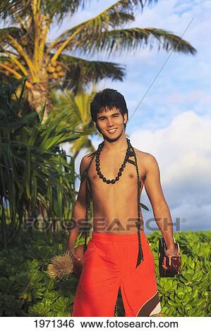 Hawaii, Oahu, Outdoor Portrait Of Young Polynesian Man With Ukulele. View Large Photo Image Stock Photograph - Hawaii, Oahu, Outdoor Portrait Of Young Polynesian Man With Ukulele.. Fotosearch