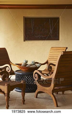 Stock Photography - Hawaii, Oahu, Patio Furnitue With Pineapples On Display.. Fotosearch