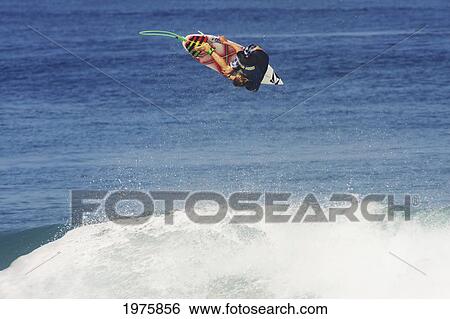 Stock Photograph - Hawaii, Oahu, Pipeline, Surfer, Riding A Wave.. Fotosearch