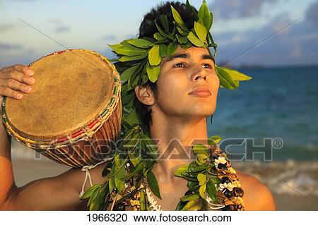 Hawaii, Oahu, Polynesian Man With Drum Along Coast, Sunrise Light. View Large Photo Image Stock Image - Hawaii, Oahu, Polynesian Man With Drum Along Coast, Sunrise Light.. Fotosearch