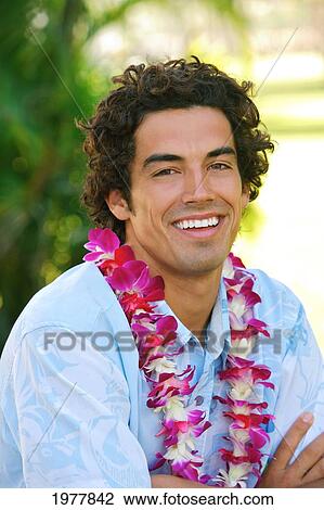 Hawaii, Oahu, Portrait Of A Good Looking Man Wearing A Lei. View Large Photo Image Stock Image - Hawaii, Oahu, Portrait Of A Good Looking Man Wearing A Lei.. Fotosearch