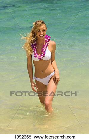 Hawaii, Oahu, Punaluu Beach, Beautiful Young Woman Standing In Turquoise Ocean. View Large Photo Image Stock Photography - Hawaii, Oahu, Punaluu Beach, Beautiful Young Woman Standing In Turquoise Ocean.. Fotosearch