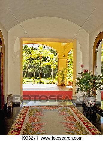 Stock Image - Hawaii, Oahu, Royal Hawaiian Hotel, View From Lobby Looking Out To Gardens. Fotosearch